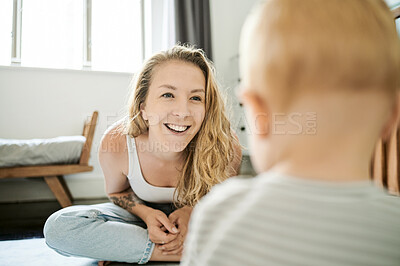 Buy stock photo Mother, baby and parent playing with child in a bedroom with a smile, care and happy together in a home. Bonding, single mom and woman spending quality time and play with her kid for happiness