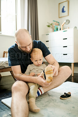 Buy stock photo Dress, shoes and father with baby in living room for ready, morning routine and clothes. Bonding, support and help with man and young child in family home for happy, change and learning