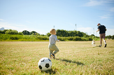 Buy stock photo Soccer, sports and baby with ball and father for playing, having fun and adventure in countryside. Childhood, family and happy boy and dad outdoors for games on holiday, summer vacation and weekend