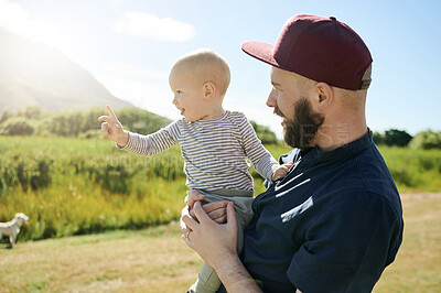 Buy stock photo Family, nature or father carry baby in nature for bonding, quality time and adventure in countryside. Childhood, love and curious boy with dad relaxing outdoors on holiday, summer vacation or weekend