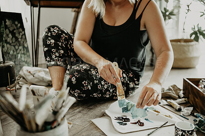 Buy stock photo Paint, brush and oil with woman on floor with mixing for project in studio with inspiration and passion at house. Female artist, colour and palette in closeup at workshop for art with talent.