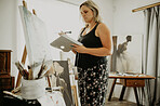 Woman, painting and creative art in studio, home or house with brush, paint and canvas. Artist person and relax painter with talent for design in workshop