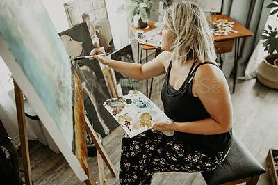 Buy stock photo Art, inspiration and painting, woman in studio at home with paint brush, canvas and creativity with color. Painter, tools and talent, professional artist with vision and freedom for creative work.