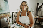 Woman, painting and creative art in studio, home or house with paint and canvas. Confident portrait of artist and relax painter with talent for design in workshop