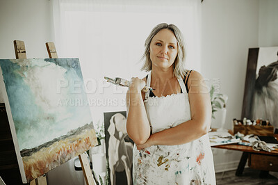 Buy stock photo Canvas, painting and portrait of woman in studio for creative hobby, artistic creation and design. Art, painter and female person with paintbrush for watercolor drawing or illustration in workshop