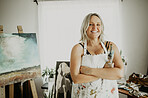 Woman, painting and creative art in studio, home or house with paint and canvas. Happy smile portrait of artist and relax painter with talent for design in workshop