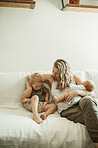 Mom, baby and sibling on sofa in home living room with care, love and bonding together to relax. Mama, woman and kids with infant, brothers and family house on lounge couch for childhood development