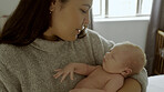 Parent, newborn and mom with baby as care, love or bonding in a home as affection together. Sleeping, support and mother relax in bedroom with kid as family in house for childcare and comfort
