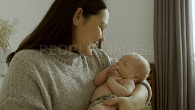 Buy stock photo Care, family and mom bonding with her newborn for nap time in a modern nursery room at home. Smile, love and happy young mother holding her sleeping infant, baby or child with happiness in bedroom.