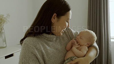 Buy stock photo Happy, love and woman with her newborn child in a modern bedroom in the family house. Smile, care and young mother holding her infant, baby or kid for bonding with happiness in nursery at home.