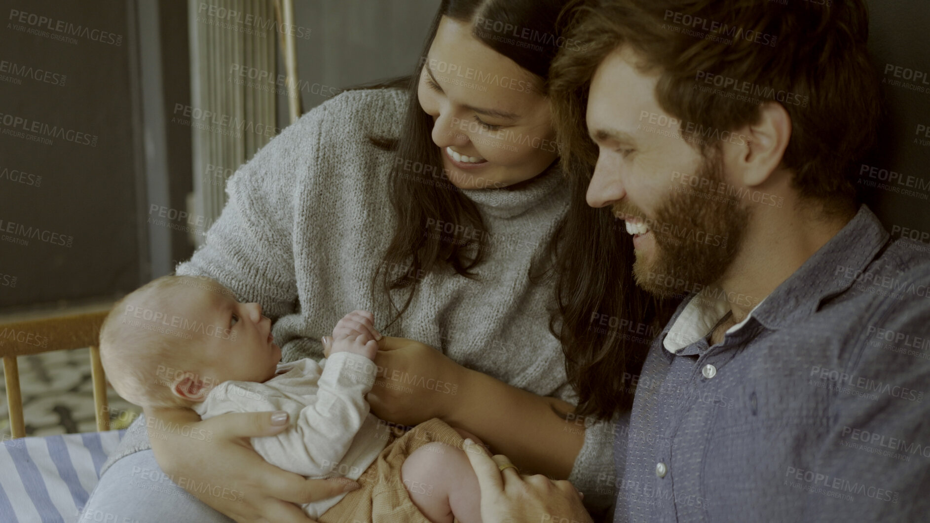 Buy stock photo Parents, newborn and happy couple with child for love, care or bonding in a home as fun or affection together. Happiness, dad and mother relax in living room with infant kid as family in house