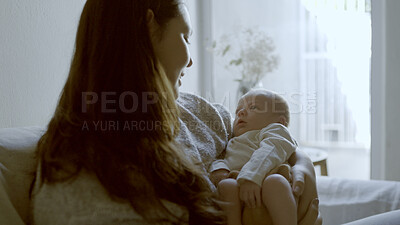 Buy stock photo Care, love and mother with her newborn on a sofa for relaxing, bonding and resting in living room. Smile, sweet and young mom holding her infant, baby or child with happiness in lounge of family home
