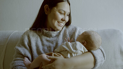 Buy stock photo Happiness, mother and newborn bonding in arms for care and love on sofa in lounge of family home with smile. Relax, woman and baby sleeping for development and growth on couch in living room of house