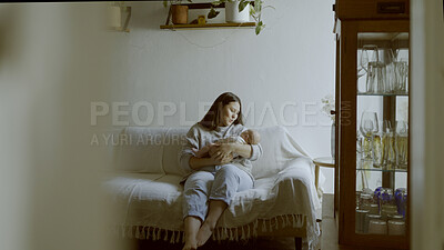 Buy stock photo Relax, care and a mother with a baby on the sofa of a living room for bonding or love. House, family and a young mom with a newborn child on the lounge couch for holding in motherhood and calm
