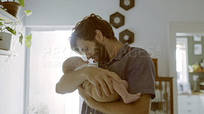 Buy stock photo Love, hug or father with newborn in home for care or bonding together to nurture child development. Relax, baby or proud single parent dad with an infant for support, trust or comfort in family house
