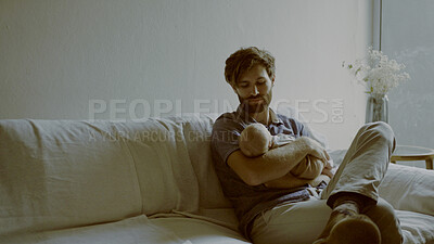 Buy stock photo Newborn, sofa or father with baby in home for care or bond together to nurture child development. Hug, safety or single parent dad with infant for support, trust or love in family house to relax