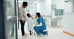 Black family, healthcare and a pediatrician talking to a patient in the hospital for medical child care. Kids, trust or medicine and a nurse consulting a boy with his mother in the clinic for health