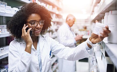 Buy stock photo Phone call, pharmacist and woman check medicine for stock, inventory or health. Smartphone, talk and happy pharmacy worker reading medical information on drugs for telehealth, prescription or pills