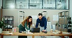 Man, woman and laptop in warehouse, boxes and problem solving with teamwork for logistics. People, reading and inventory with computer, collaboration and review stats with stock for supply chain