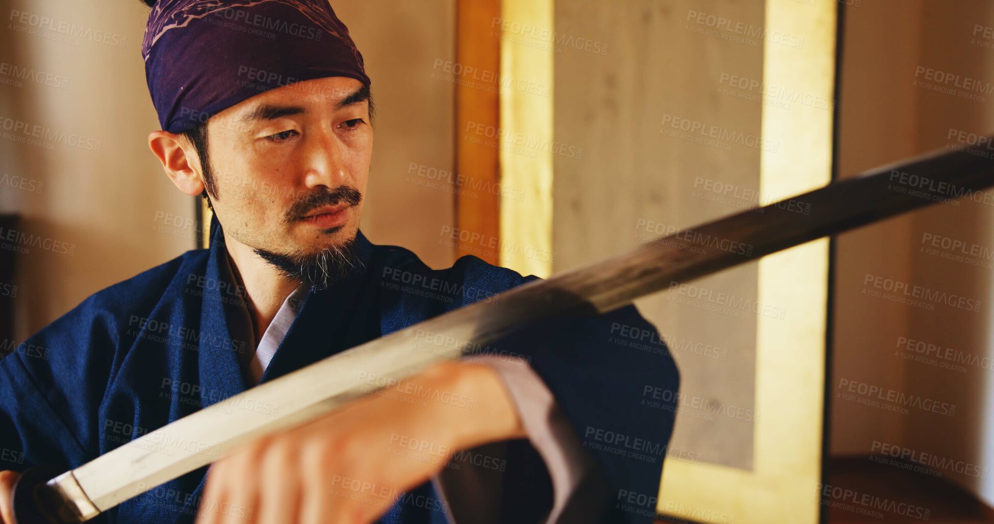 Buy stock photo Culture, Kenjutsu and sword with Samurai man in Japan for combat, martial arts or training, Dojo, fighting and weapon with Japanese person in kendogi for discipline, exercise or practice routine