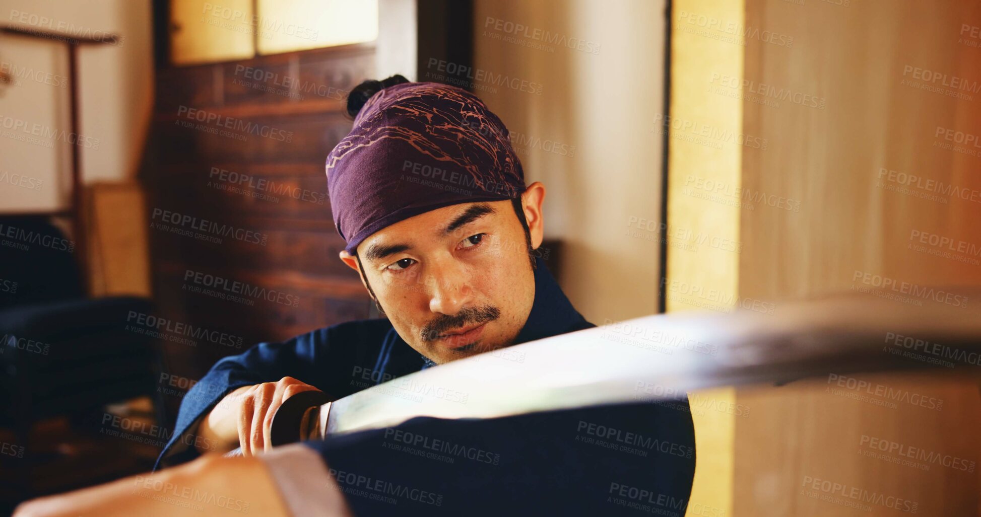 Buy stock photo Dojo, form and sword with Samurai man in Japan for combat, martial arts or training, Culture, fight and weapon with face of Japanese person in kendogi for discipline, exercise or kenjutsu routine