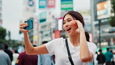 Buy stock photo Japanese woman, selfie and hand sign in city with live streaming of vlogger for content creation. Video, social media and profile picture in Tokyo with travel love, vacation and app with post and web