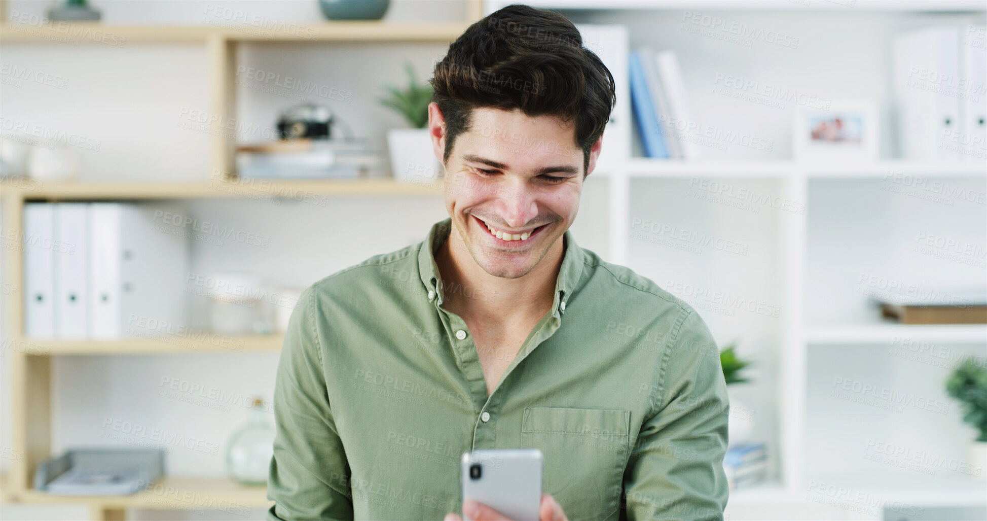 Buy stock photo Happy, phone and business man in office with smile for online joke, social media and internet post on break. Professional, startup and person on smartphone for connection, funny text and contact
