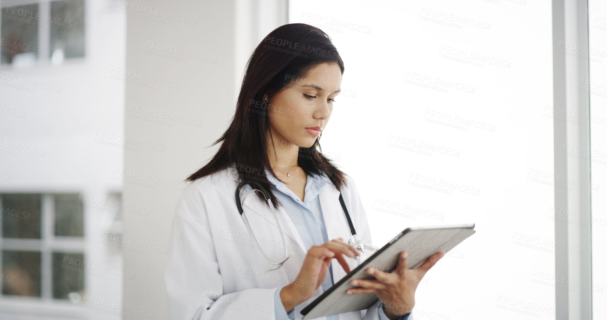 Buy stock photo Healthcare, serious and doctor with tablet, hospital and woman with diagnosis for cure and browsing. Clinic, medical professional and person with app for prescription, online and research for info