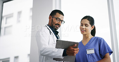 Buy stock photo Healthcare, doctors and tablet in hospital for discussion, patient update or medical research. Below, man and nurse in clinic lobby for information report, good news or surgery feedback on technology