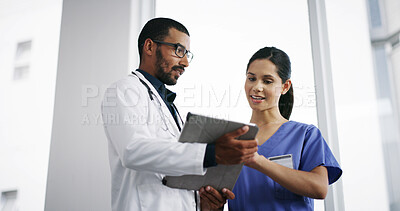 Buy stock photo Healthcare, doctor and nurse with tablet in hospital for medical planning, surgery results or discussion. Low angle, medicine team or happy with digital app for health information or diagnosis result