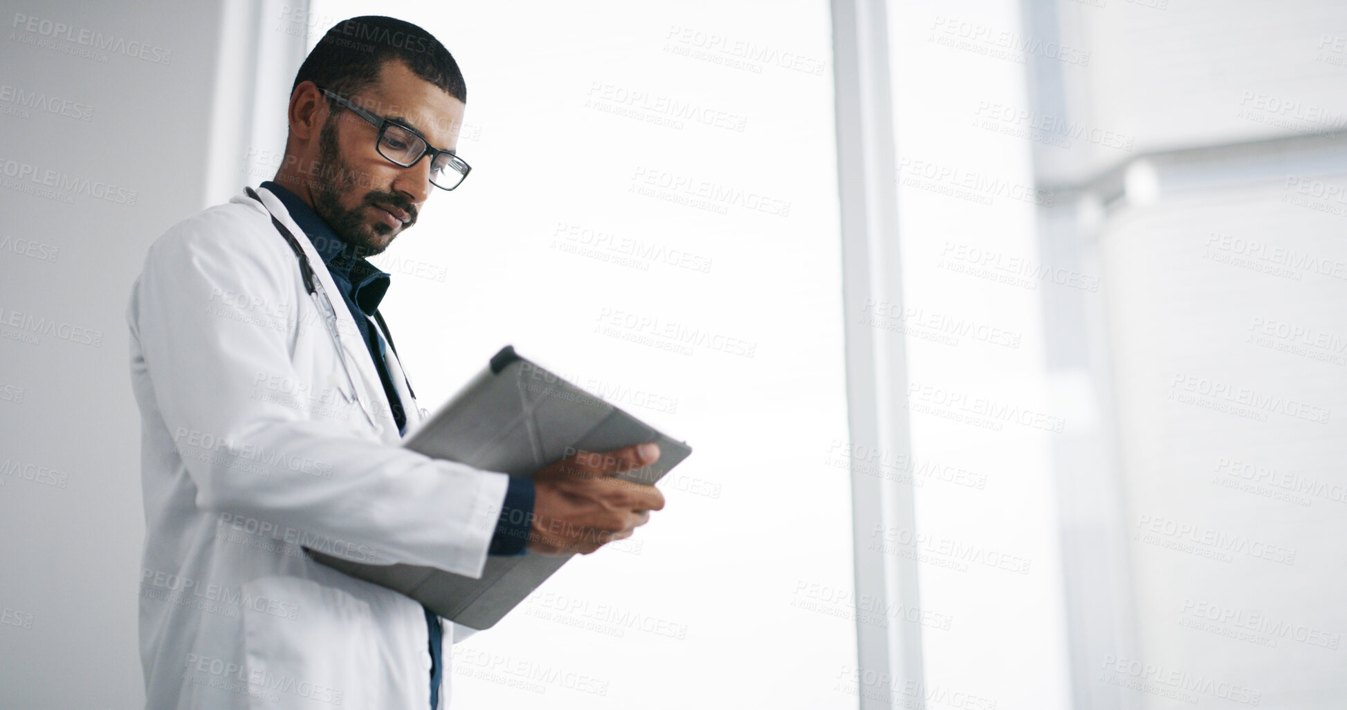Buy stock photo Healthcare, reading and doctor with tablet, hospital and man with diagnosis for sickness and thinking. Clinic, medical professional and person with app for prescription, space and research for cure