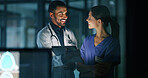 Healthcare, doctor and nurse with tablet in clinic for medical research, patient record review or discussion. Night, medicine team or happy with digital app for health information or diagnosis result