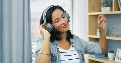 Buy stock photo Woman, relax and dance with headphones at house for listen to music, streaming audio and energy. Female person, technology and moving for rhythm, playlist sound and carefree freedom with subscription