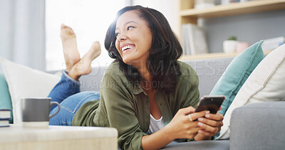 Buy stock photo Lounge, thinking and woman with smartphone, laughing and funny videos on social media, relax and happy. House, scroll and entertainment for person in living room, digital and comfortable in weekend