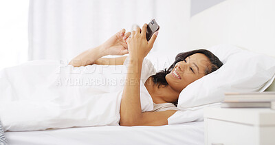 Buy stock photo Happy, browsing and woman with smartphone, bedroom and funny videos on social media, relax and online. House, scroll and entertainment for person with app, break and streaming with subscription