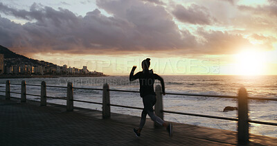 Buy stock photo Woman, runner and outdoor sunrise for fitness, sports training and promenade for athlete performance. Female person, ocean workout and morning for marathon practice, exercise and speed challenge