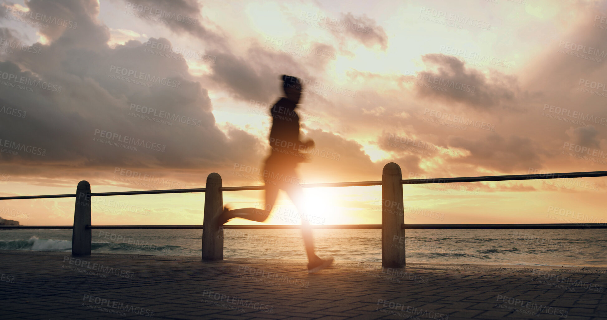 Buy stock photo Woman, sunset and running silhouette by sea, promenade cardio and outdoor for weight loss. Female person, sports training and active athlete in nature, speed challenge and practice routine by beach