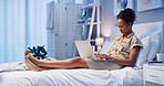 Remote work, woman and laptop in bed for typing, editing or creative writing in home. Freelance editor, tech or online in bedroom for feedback, article brainstorming or upload latest blog on platform
