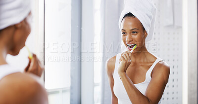 Buy stock photo Woman, brushing teeth and cleaning mouth in home, oral hygiene practice and morning routine in bathroom. Person, mirror and treatment to prevent plaque or cavity, fresh breath and dental health