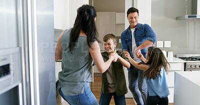 Buy stock photo Happy, parents and children with dancing in kitchen for celebration, bonding or learning steps. Energy, woman and man with kids in home for moving together with weekend entertainment, support or love
