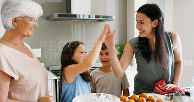 Buy stock photo Happy, family and baking in home with high five for muffin recipe success, celebration and learning teamwork. Women, children or hand gesture for bonding, culinary development or support with cooking
