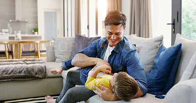 Buy stock photo Love, father and child with playing on sofa for bonding, connection or happy relationship in home. Family, man and boy kid with fun game on couch together for care, enjoyment or security with support