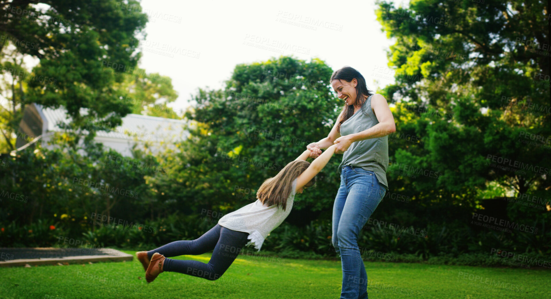 Buy stock photo Outdoor, mother and child with spinning for game, playful and relationship with bonding together. Nature, mom and girl with swinging for childhood fun, coordination and balance with trust in backyard