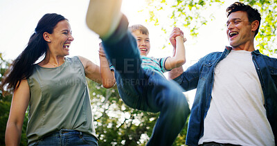 Buy stock photo Outdoor, parents and child with swinging for game, playful and relationship with bonding together. Father, mother and boy with flying for childhood fun, coordination and balance with trust in nature