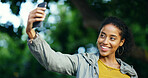 App, selfie and travel with happy woman at park for commute, holiday or vacation in nature. Photograph, smile and social media with tourism influencer outdoor for adventure or sightseeing abroad