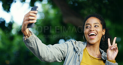 Buy stock photo Peace sign, selfie and travel with happy woman at park for commute, holiday or vacation in nature. App, smile and social media with tourism influencer outdoor for adventure or sightseeing photograph