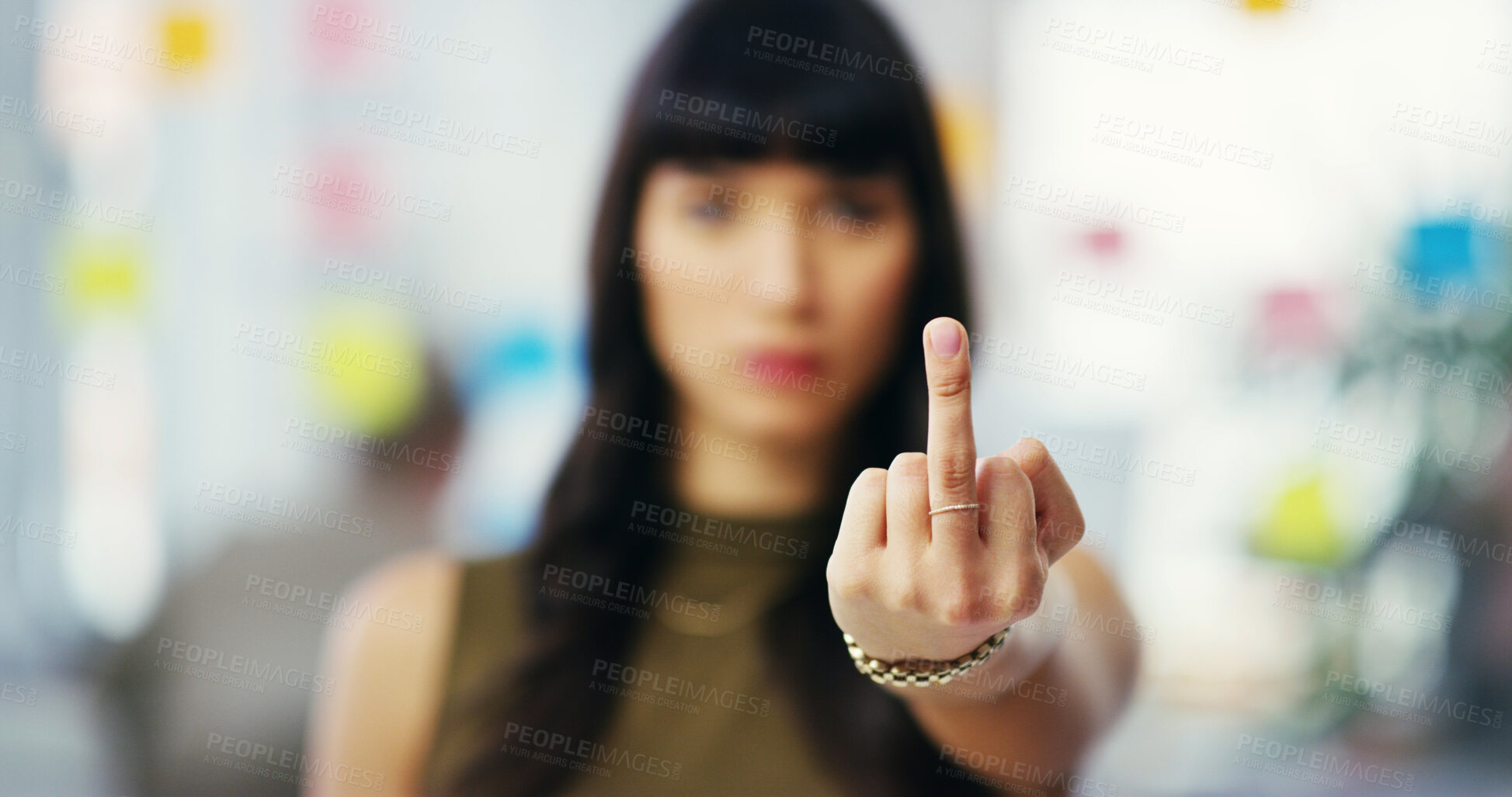Buy stock photo Office, rude and hand of woman for middle finger, frustrated expression and symbol of rebellion. Fuck you, female designer and opinion with hate emoji gesture for business conflict, curse or offended