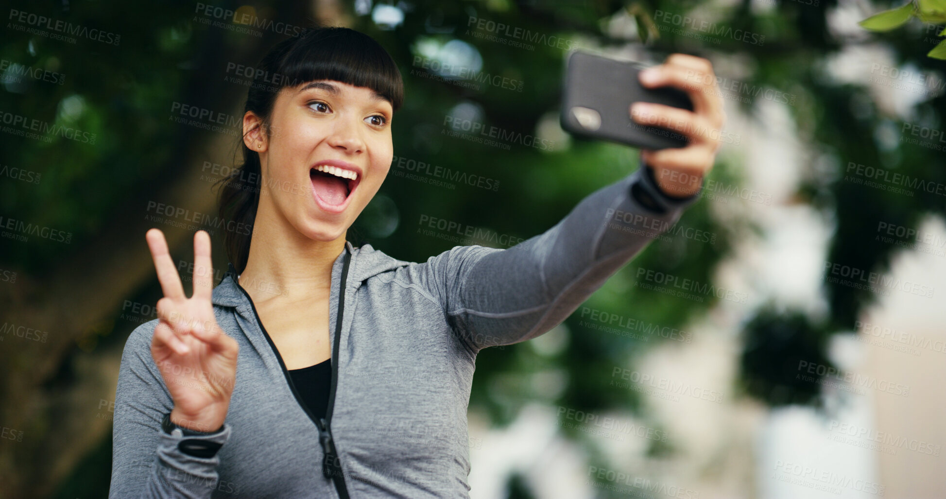 Buy stock photo Peace sign, fitness and selfie and woman in park for social media, profile picture and online post. Outdoors, nature and person with emoji take photo after workout, exercise and training for wellness