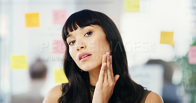 Buy stock photo Serious, skincare and woman in office, beauty and checking for pimples, routine and wellness for employee. Dermatology, journalist and inspection for acne, person and treatment for antaging of skin