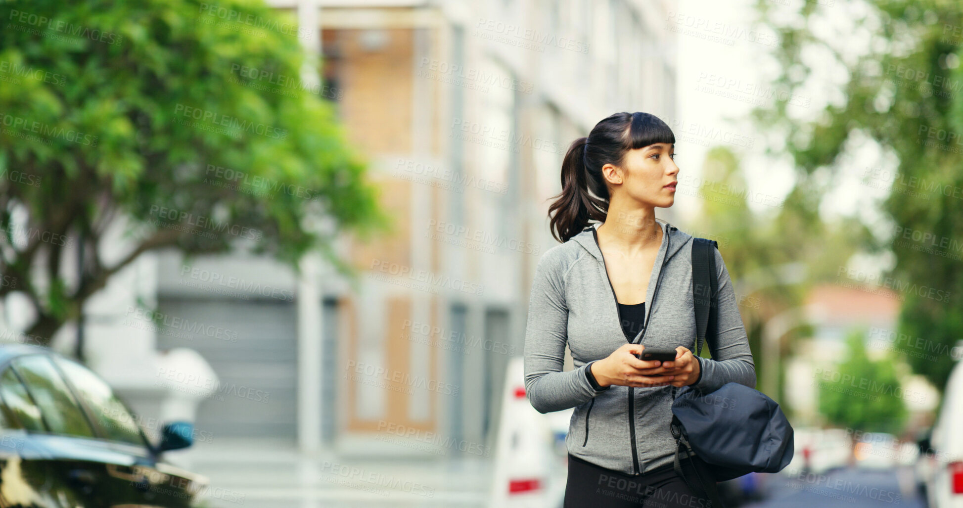 Buy stock photo Fitness, woman and walking with phone in city for gym directions, workout location and online map. Athlete, girl or smartphone in nature for communication, text message and destination search in road